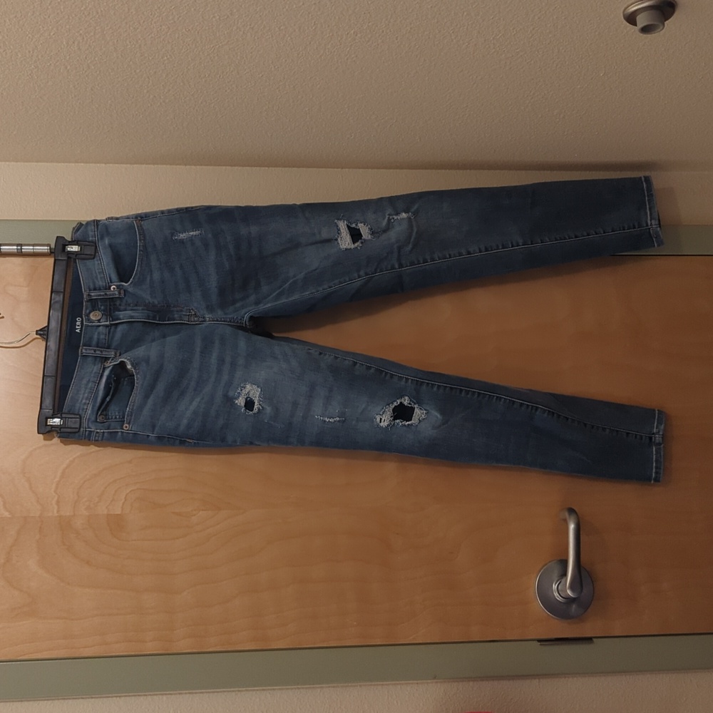 Aero jeans, size 4, patched holes